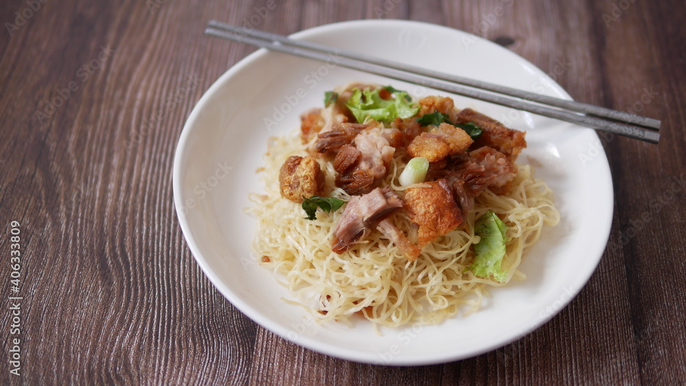 Chinese egg noodles with crispy pork