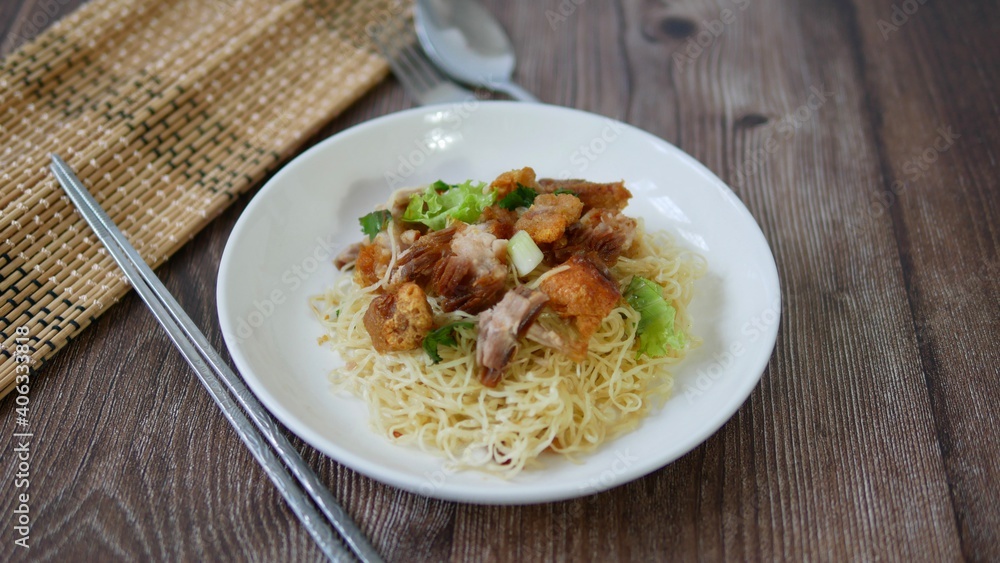 Chinese egg noodles with crispy pork Chinese egg noodles with crispy pork