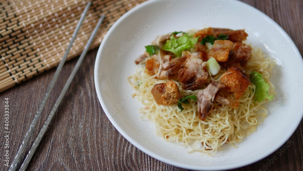Chinese egg noodles with crispy pork Chinese egg noodles with crispy pork