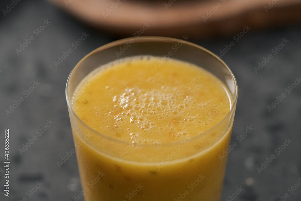 Fresh mango lulo smoothie on kitchen countertop Fresh mango lulo smoothie on kitchen countertop