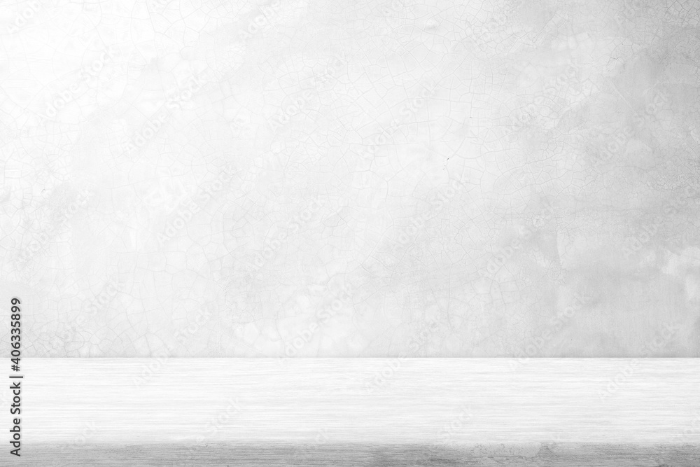 White Wood Table with Polished Raw Concrete Wall with Crack Texture on Surface Background, Suitable for Product Presentation Backdrop, Display, and Mock up. White Wood Table with Polished Raw Concrete Wall with Crack Texture on Surface Background, Suitable for Product Presentation Backdrop, Display, and Mock up.