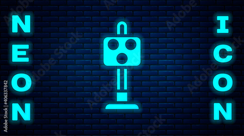 Glowing neon Train traffic light icon isolated on brick wall background. Traffic lights for the railway to regulate the movement of trains. Vector.