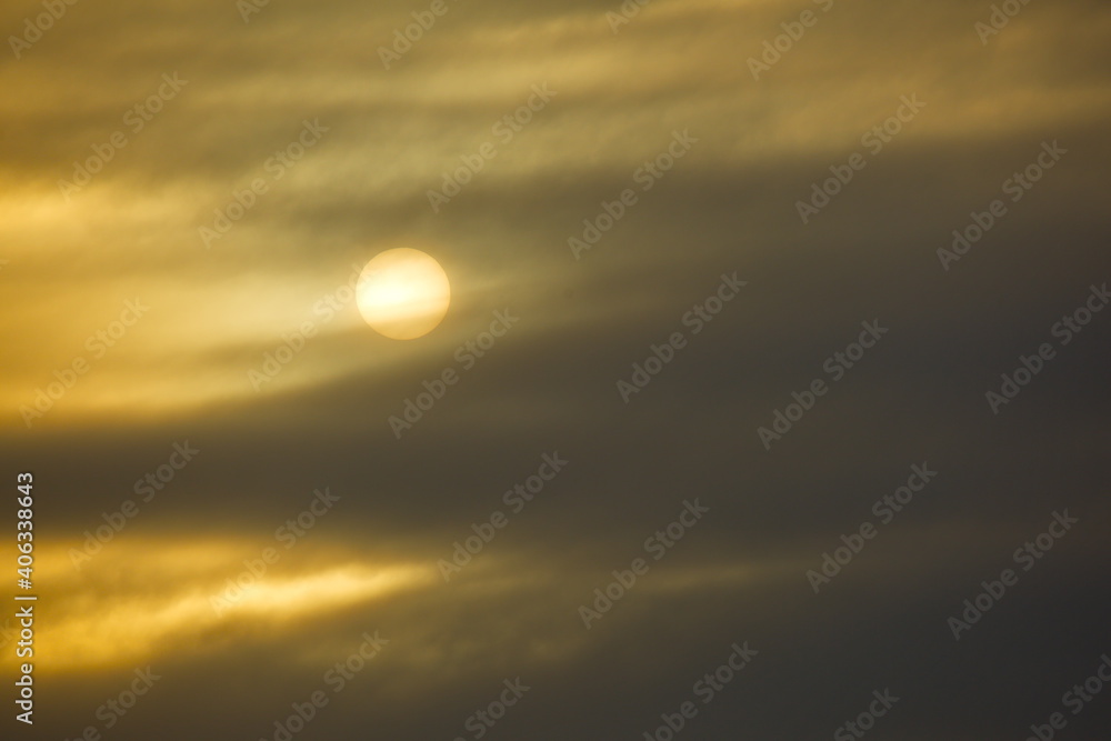 Cold sun in the winter cloudy sky. Cold sun in the winter cloudy sky.
