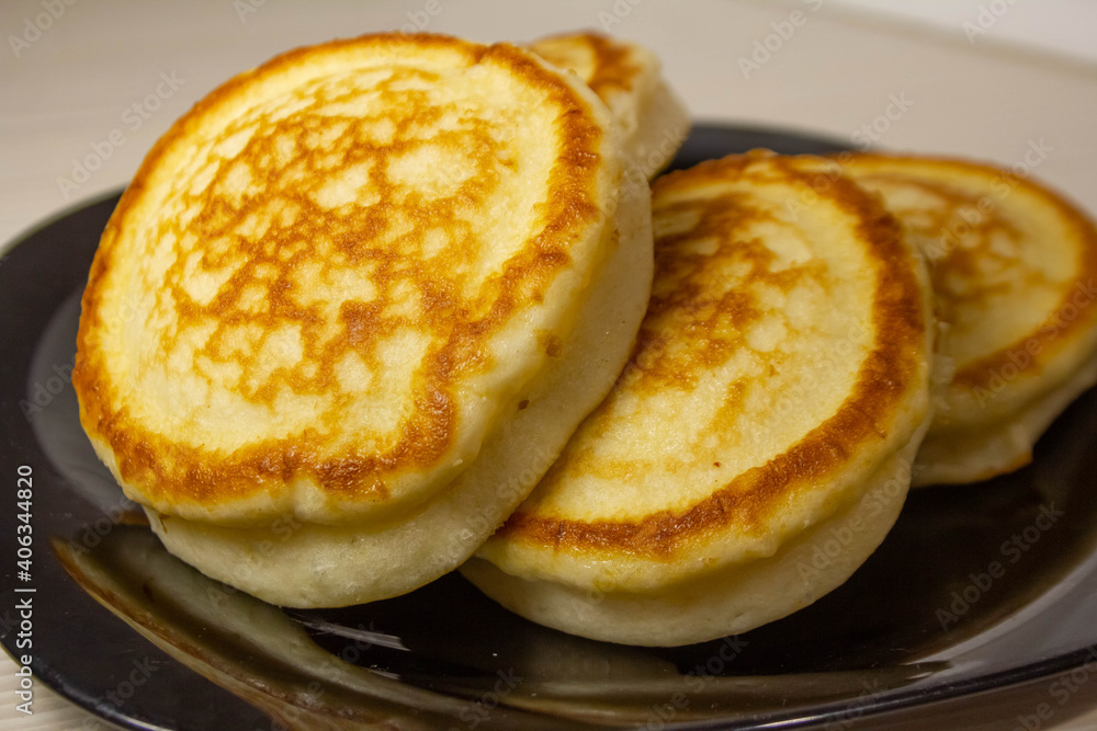 delicious pancakes on a plate are on the table close up delicious pancakes on a plate are on the table close up
