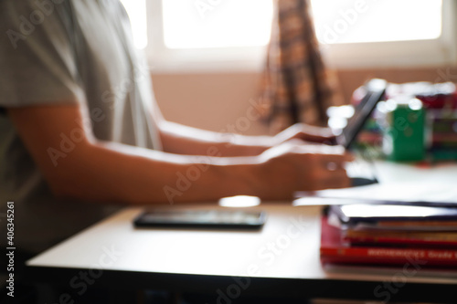 picture is blurry a man playing a tablet working,New Nomon photo