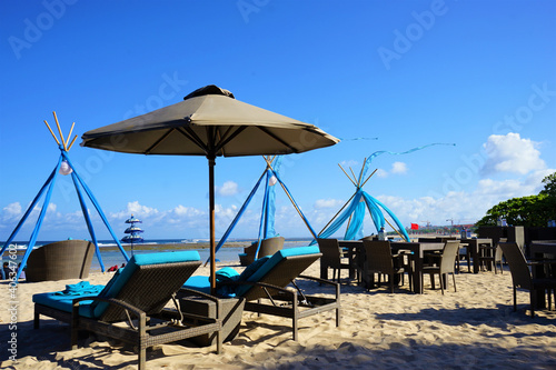 Place for beach holidays with umbrellas and chaise longue in Nusa Dua Beach  Bali island  Indonesia