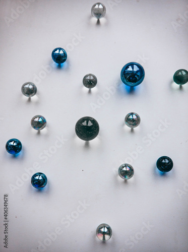 glass balls lie on a white background