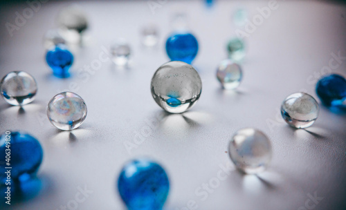 glass balls lie on a white background