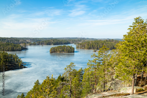 Beautiful landscape with icy lake in the national park Repovesi, Finland