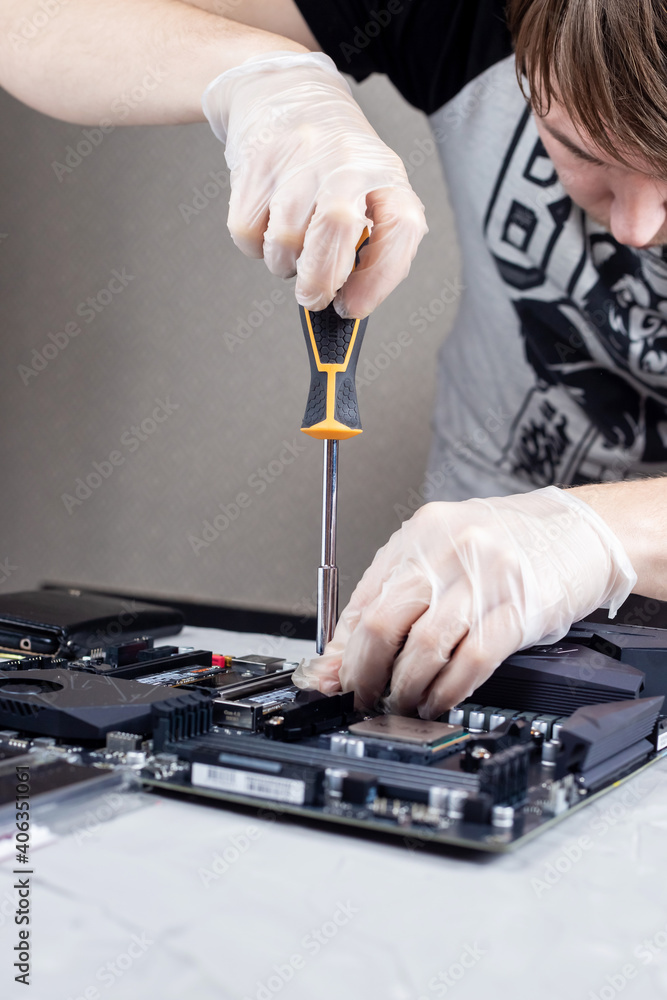 Assembling computer parts on the computer motherboard. Computer repair Assembling computer parts on the computer motherboard. Computer repair
