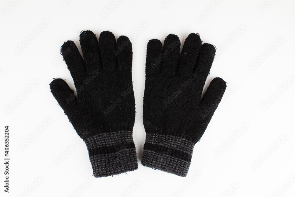 black men's winter gloves on a white background black men's winter gloves on a white background