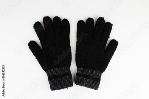 black men's winter gloves on a white background