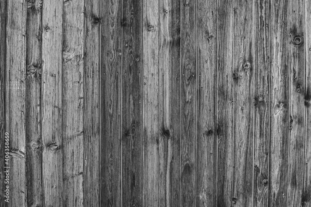 Natürliche Holztextur in schwarz und weiß. Holzbretter mit Nägeln als Hintergrund. Raue Beschaffenheit von Materialien. Natürliche Holztextur in schwarz und weiß. Holzbretter mit Nägeln als Hintergrund. Raue Beschaffenheit von Materialien.