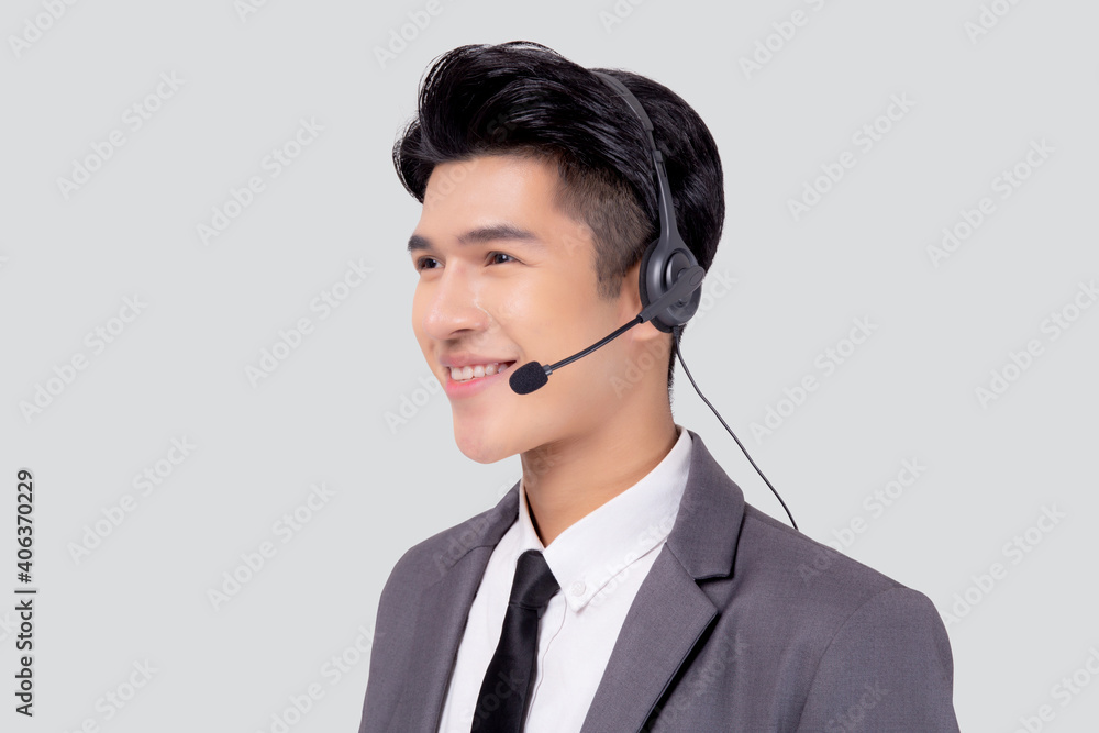 Portrait young asian business man call center wearing headset isolated on white background, agent with support and service, businessman is assistant for client with phone or helpline online. Portrait young asian business man call center wearing headset isolated on white background, agent with support and service, businessman is assistant for client with phone or helpline online.