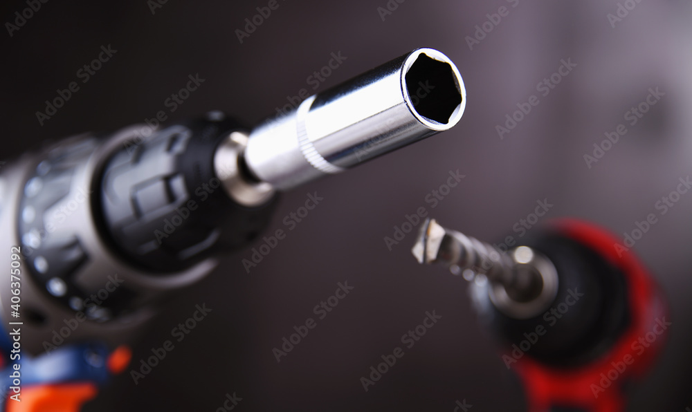 Fototapeta premium A screw gun and a pistol-grip cordless drill