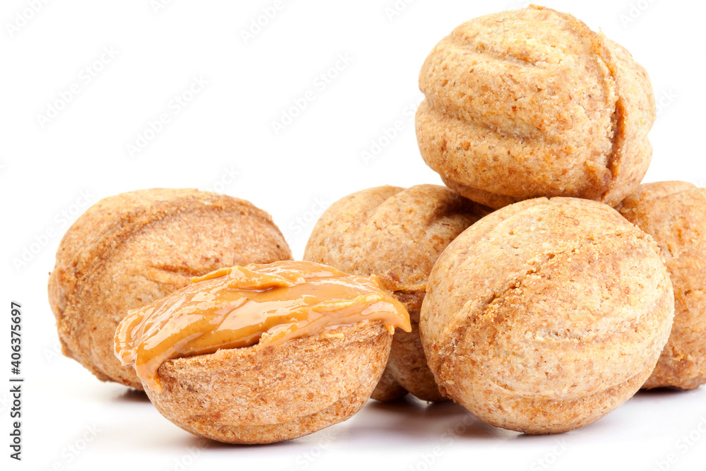 delicious pastry nuts with condensed milk isolated on white delicious pastry nuts with condensed milk isolated on white