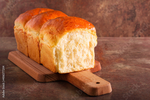Homemade soft, fluffy white bread loaf photo