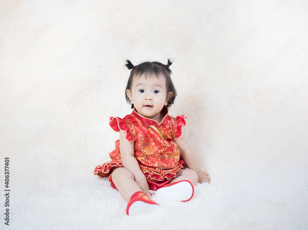 Chinese cute baby girl traditional dressing up celebrate Chinese new year, Selective focus Chinese cute baby girl traditional dressing up celebrate Chinese new year, Selective focus