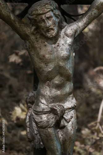 Ancient metal sculpture of the crucifixion of Jesus Christ