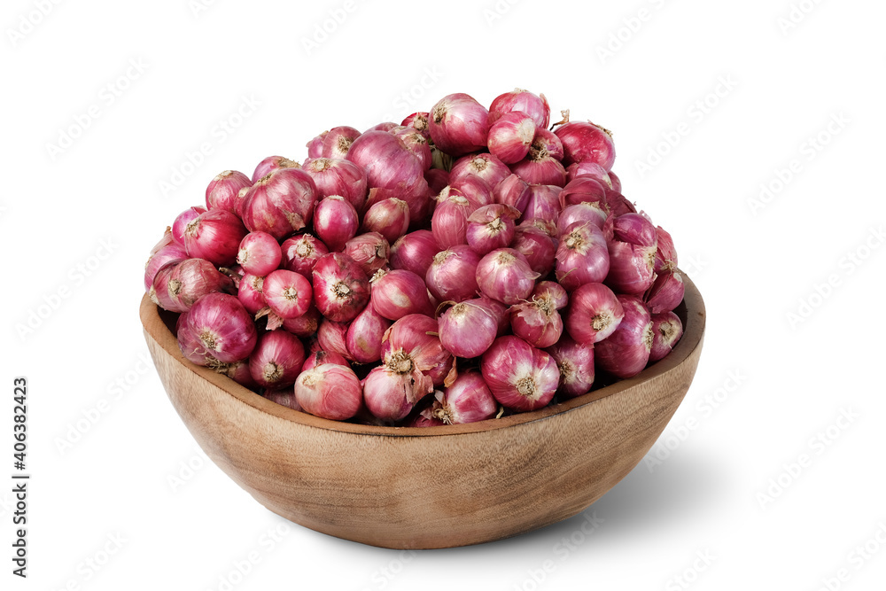 Shallots in wooden bowl isolated on white background. Shallots in wooden bowl isolated on white background.