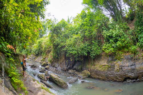 River flowing through jungle at  the Hidden Canyon Beji Guwang