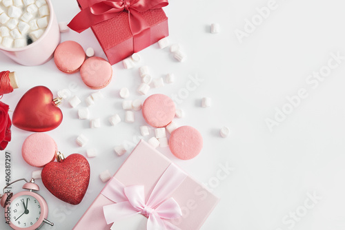 Valentine's day greeting card. Flowers and gifts boxes on white background. Happy birthday and mother's day template. © Aleksandr