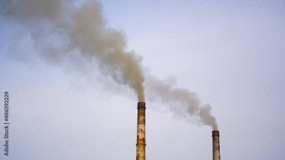 Industrial chimneys with gas and smoke. Towers with vapor from metallurgical industrial factory. Poisoned air. Pollution of nature. Toxic substances. Industrial chimneys with gas and smoke. Towers with vapor from metallurgical industrial factory. Poisoned air. Pollution of nature. Toxic substances.