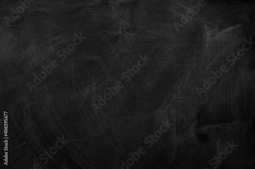 Texture of chalk on black chalkboard or blank blackboard background. School education, dark wall backdrop, template for learning board concept.