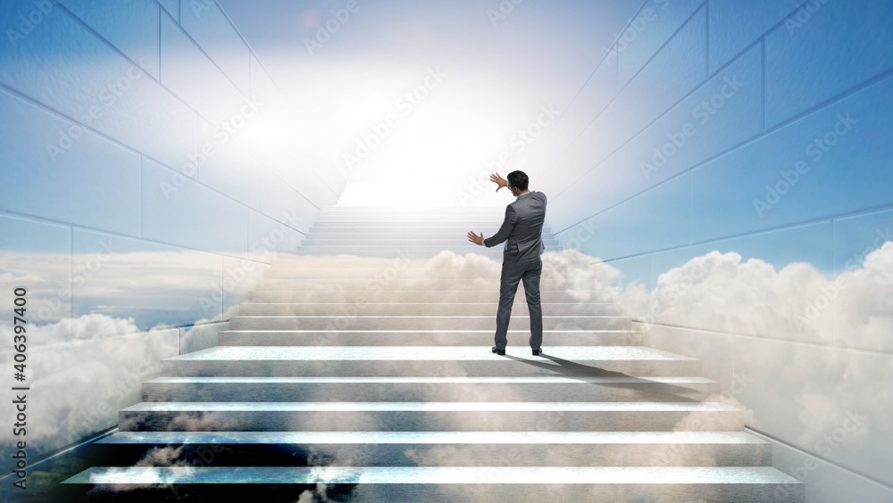 Businessman climbing up challenging career ladder in business co Businessman climbing up challenging career ladder in business co