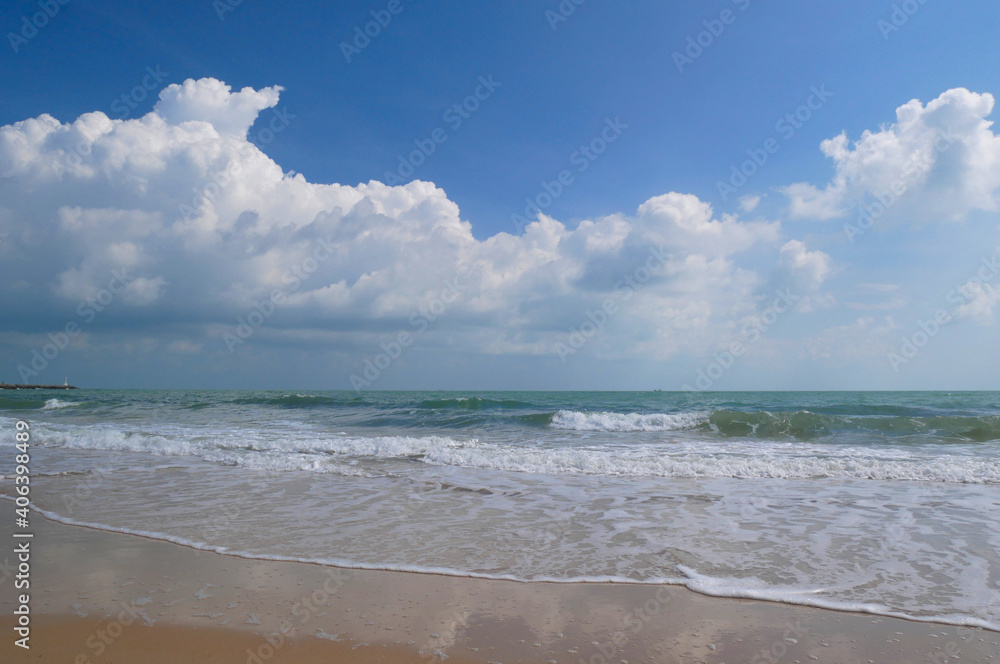 Beautiful tropical sea and sand beach with blue sky for background