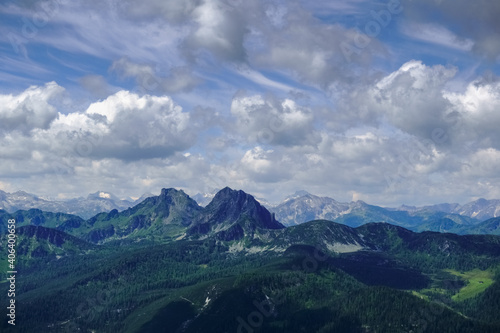 two peaks from mountains in a wonderful landscape with clouds