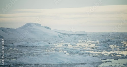 Ilulissat fast moving icebergs timelapse photo