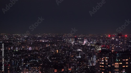 Wallpaper Mural High above aerial night cityscape of Tokyo suburban area with flickering lights Torontodigital.ca