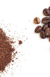 A pile of whole roasted coffee beans and another pile of grounded coffee on an isolated white background, from a high angle view covering the corners of the frame. 