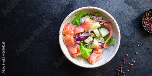 salmon salad vegetables lettuce, potato, seafood ready to eat on the table for healthy meal snack outdoor top view copy space for text food background image rustic keto or paleo diet pescetarian