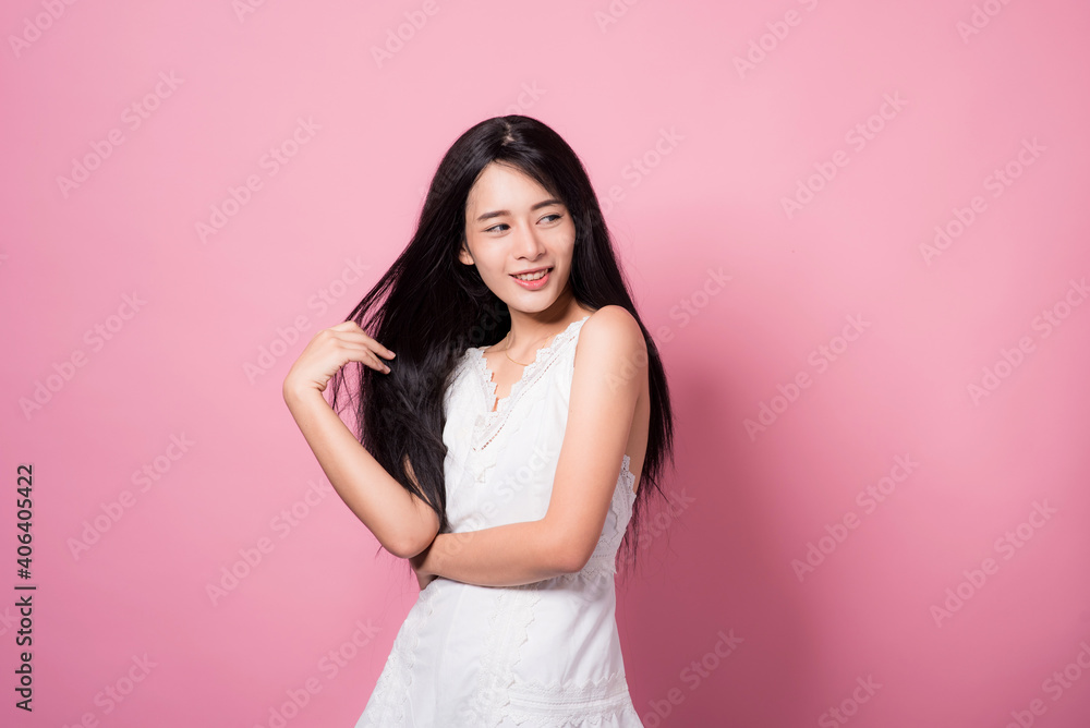 Portrait of beautiful asia young woman on Pink color background with copy space. Human face expressions, emotions feelings, body language,beauty and fashion concept. Portrait of beautiful asia young woman on Pink color background with copy space. Human face expressions, emotions feelings, body language,beauty and fashion concept.