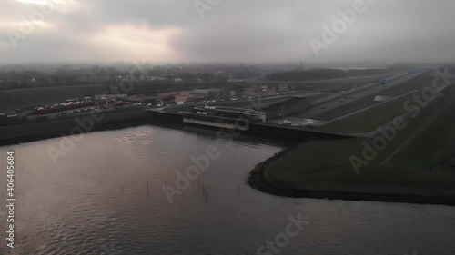 Wallpaper Mural Noord River With A15 Motorway Next To Waste Collection Stations In Hendrik-Ido-Ambacht On A Gloomy Day. - aerial Torontodigital.ca