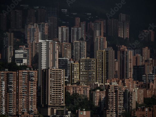Urban cityscape panorama of high rise modern office buildings residential skyscrapers in Medellin Antioquia Colombia photo