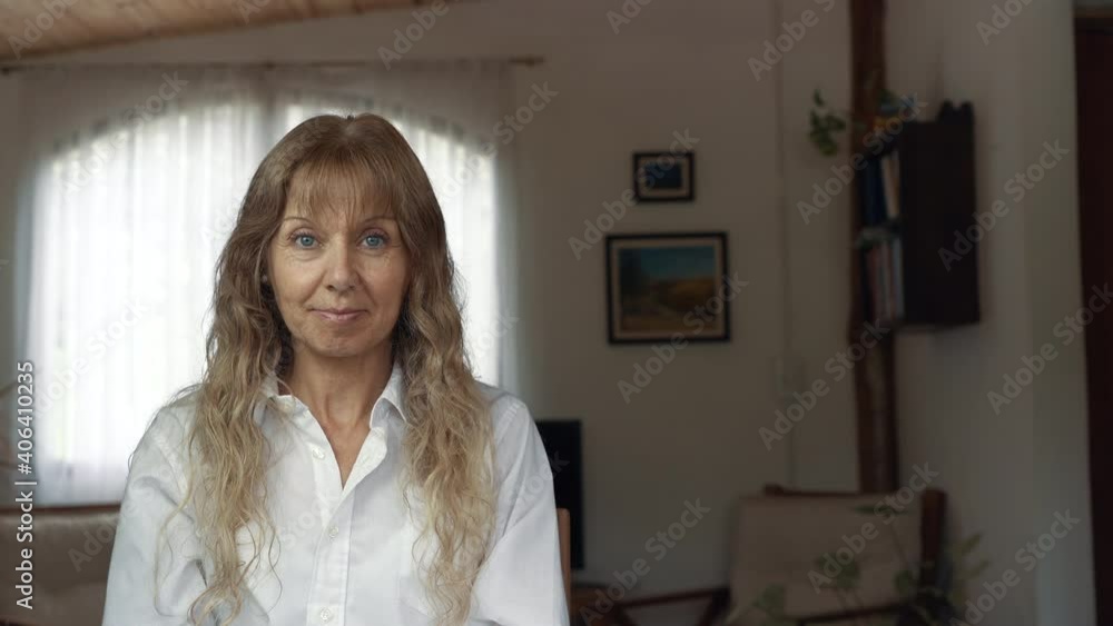 Blond woman is relived when taking off her mouth mask when coming home. Close up shot Blond woman is relived when taking off her mouth mask when coming home. Close up shot