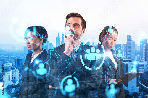 Photography Group of SMM specialists working on social media marketing strategy to achieve business goals