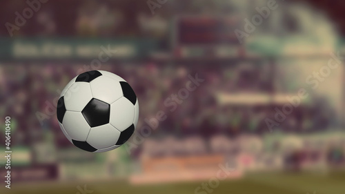 Soccer ball in the air. Close-up. Blurred background © Black Morion