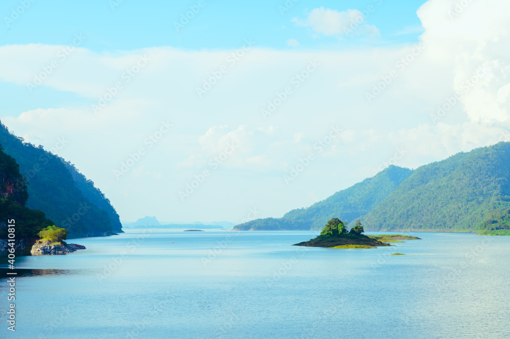Lake with mountain and blue sky view.