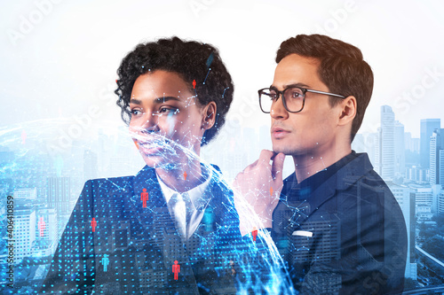 Canvas Print Businessman and businesswoman as a SMM specialists thinking about development of social media marketing strategy to achieve business goals