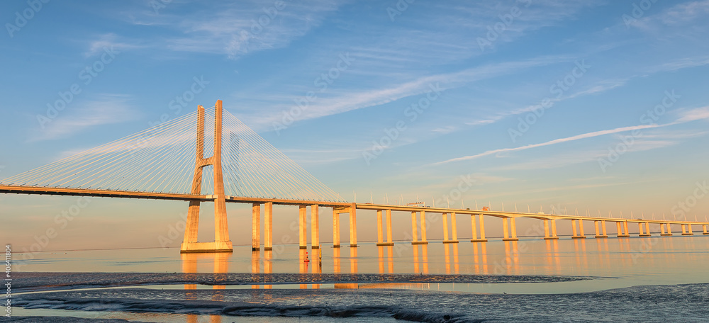 Obraz premium Lisbon, Portugal. Vasco da Gama bridge in sunny day. Europe
