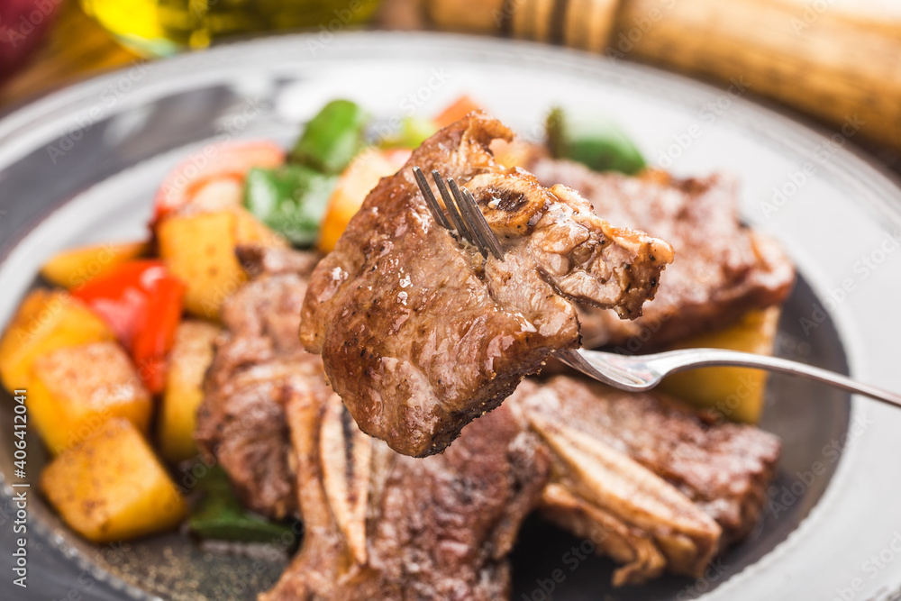 A plate of fresh fried beef ribs A plate of fresh fried beef ribs