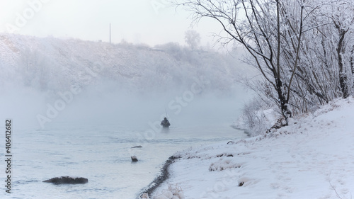 winter fishing in the river  © Aleksei