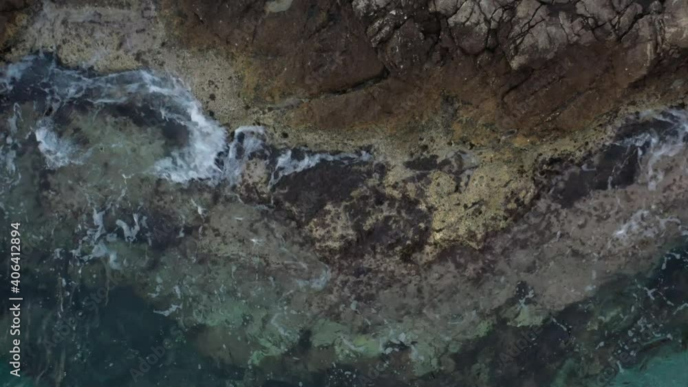Rolling Powerful Waves Splashing on Rocks, Aerial View Rolling Powerful Waves Splashing on Rocks, Aerial View