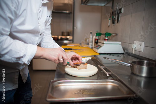 Fototapeta Naklejka Na Ścianę i Meble -  chef preparing food in the kitchen