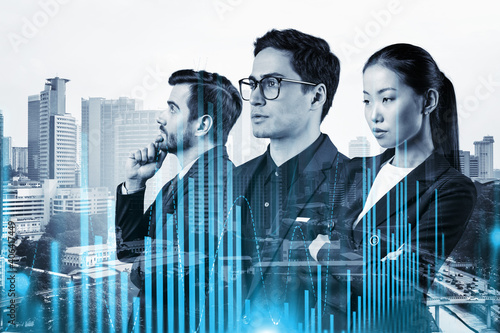Photography Group of business colleagues in suits as a part of multinational corporate team working on forecasting trading corporate strategy at fund