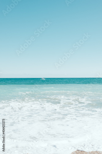 vertical empty turquoise mediterranean beach 